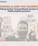 A Black man in a mask that says "I Can't Breathe" in front of racial justice protesters
